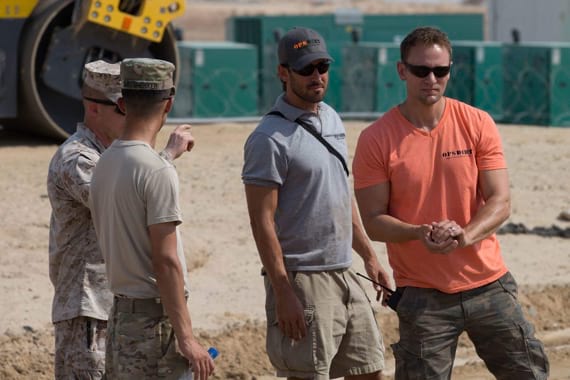 4 people standing at jobsite in Kuwait